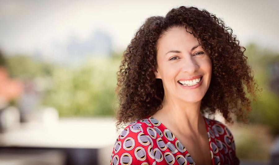 Woman smiling outside